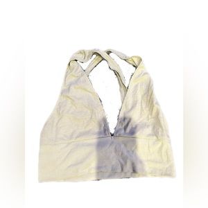 Light green crop top with crossed straps